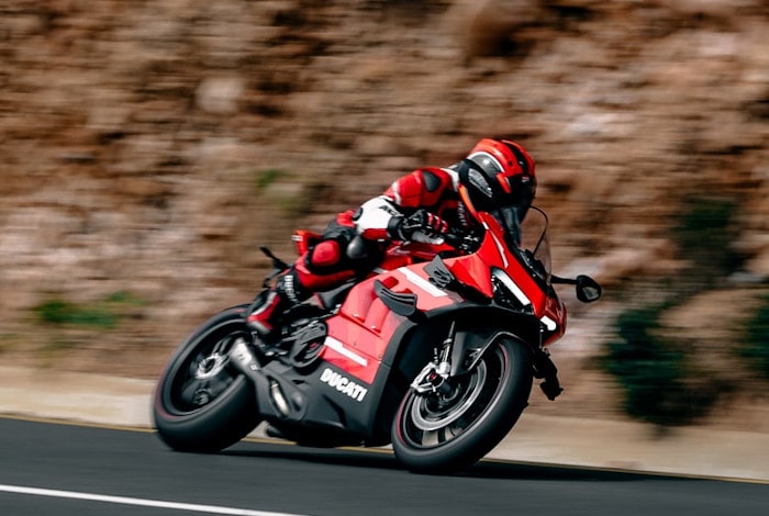 Motorcyclist driving on the road